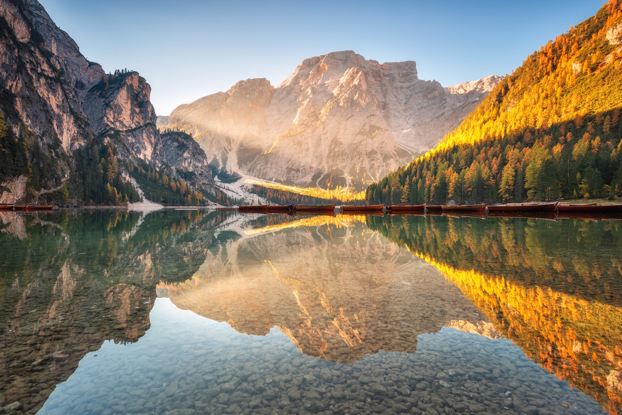 Beautiful Braies lake at sunrise in autumn in Dolomites, Italy
