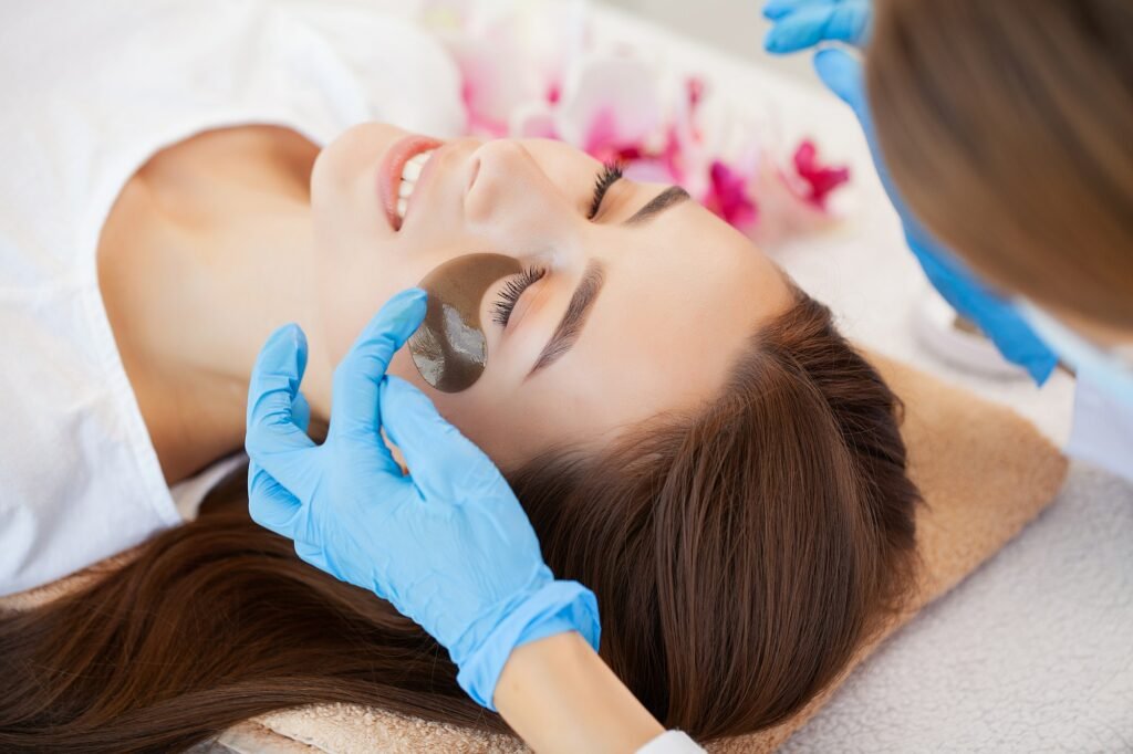 Woman With Eye Patches, Relaxing In Spa Center, Luxury Spa Experiences