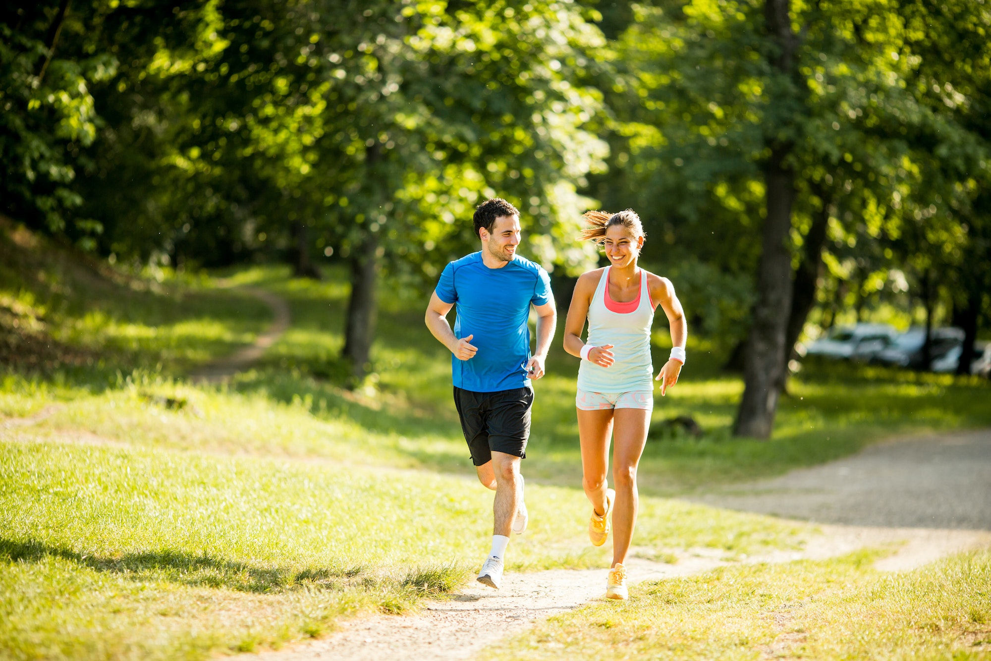 Young couple running, Couple's Wellness Retreats