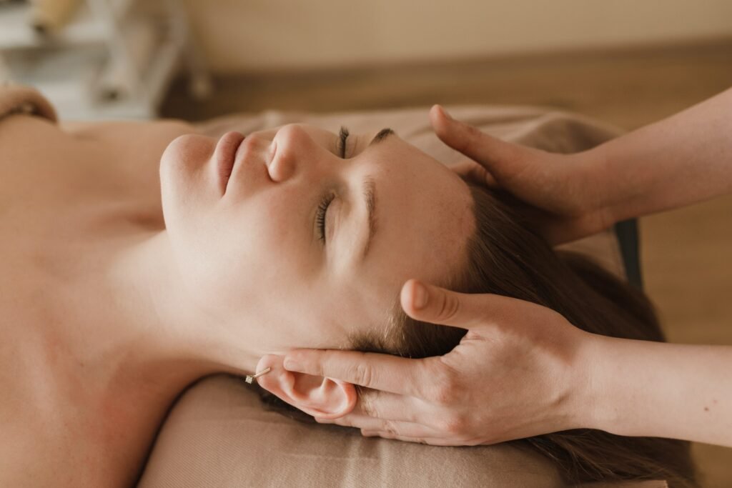 A Woman Having a Head Massage