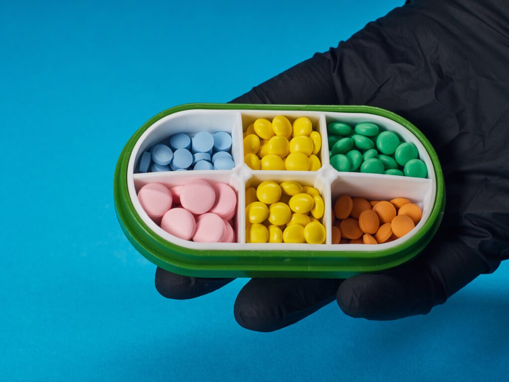 a pill box filled with lots of pills