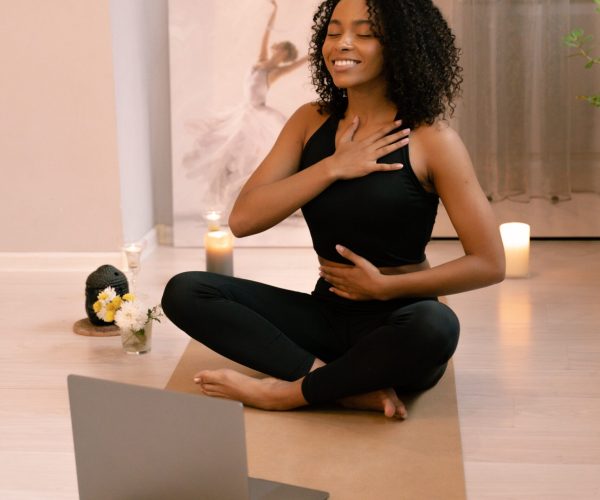 Woman with Curly Hair Doing Yoga